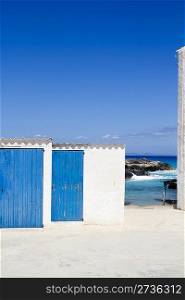 Es calo escalo Formentera white balearic architecture blue wooden door