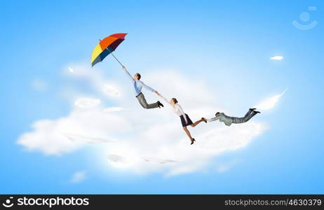 Escape from office. Business people flying in the sky on umbrella