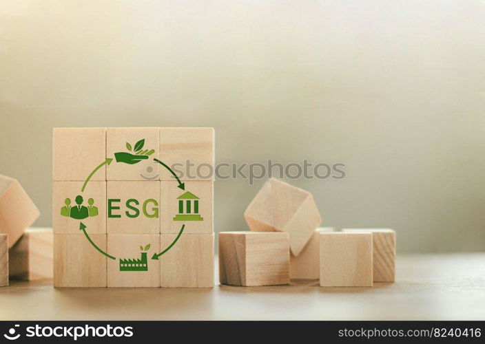 ESG concept in renewable resource economy, recycling, environment, reuse, production, sustainable development. with symbol icon on wooden block