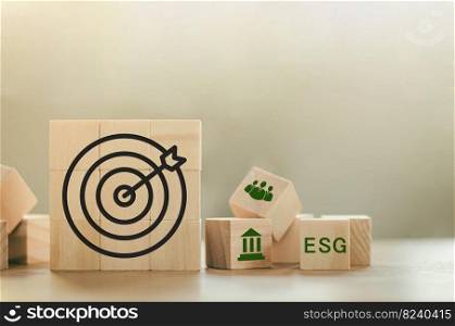 ESG Concepts on Environment, Society and Governance along with sustainable development of the organization Target symbol and ESG icon on wooden block background. copy space