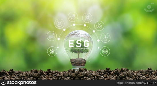 ESG icon concept in hand-held bulb for environmental, social and governance in sustainable and ethical business on network connection. icon on a light bulb with a growing tree