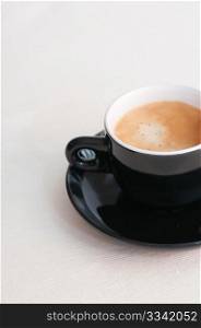 Espresso Coffee in Black Mug on Light Tablecloth in Black Mug on Light Tablecloth