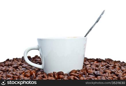 espresso cup in coffee beans, isolated on white