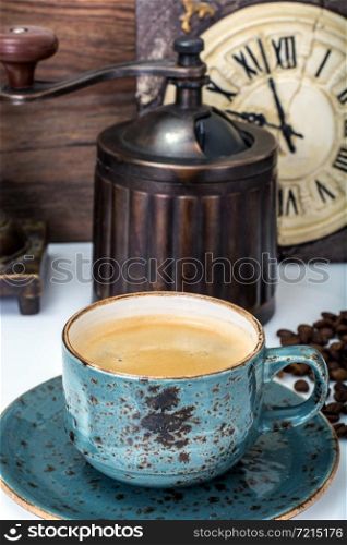Espresso in vintage blue cup. Studio Photo. Espresso in vintage blue cup