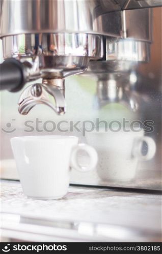 Espresso shot in white cup, stock photo