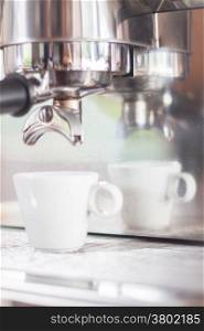 Espresso shot in white cup, stock photo
