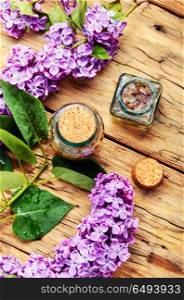 Essence of lilac flowers. Bottle of essential extraction with lilac.Healing herbs.Alternative Medicine Herbal Medicine