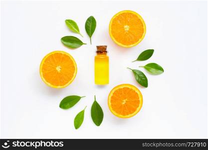 Essential oil with fresh orange citrus fruit on white background