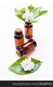 Essential oil with jasmine flower.. Essential oil with jasmine flower on white background.