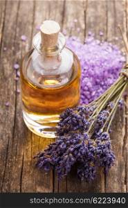 essential oil with lavender flower and seasalt - spa concept. The essential oil