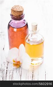 essential oil with orchid flower - spa concept