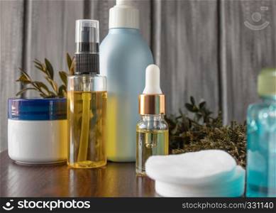 Essential oils in bottles. Cosmetic essential oil for skin care.. natural cosmetic essential oil in a bottle with a pipette.