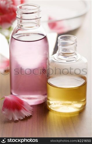 essential oils in bottles. spa and body care background