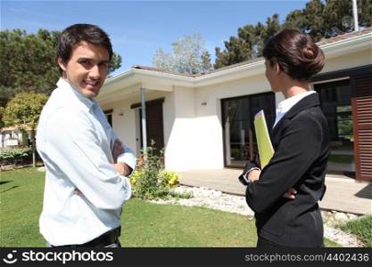 Estate-agent outside property