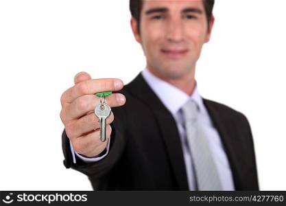 Estate agent with a house key