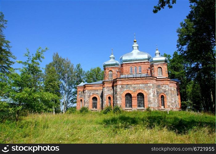 Estonia. Beautiful operating church on a background of the sky