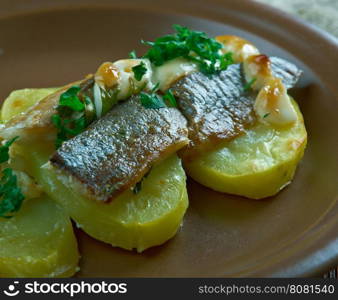 Estonian Baked Herring with Potatoes. Baltic cuisine