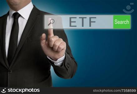 ETF internet browser is operated by businessman.. ETF internet browser is operated by businessman
