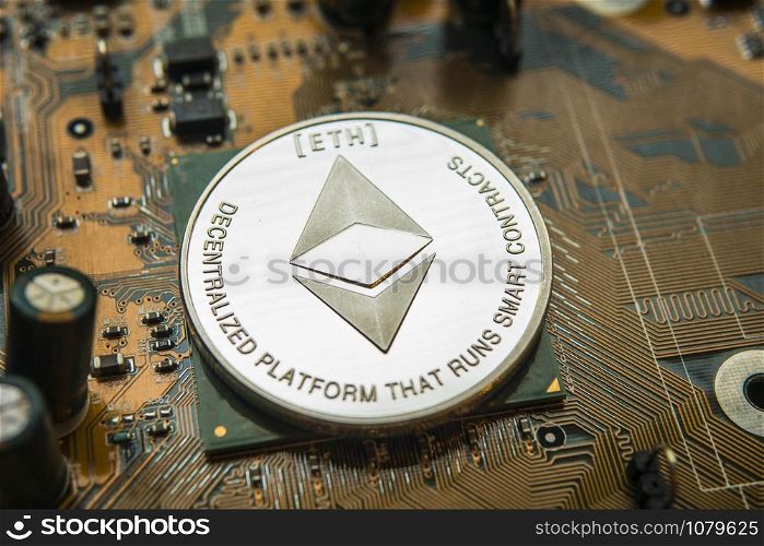 ethereum. Crypto currency ethereum. ethereum coin on exchange charts. e-currency ethereum on the background of the circuit motherboard