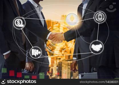 Ethereum ETH and cryptocurrency payment acceptance concept - Businessman handshaking showing accepted payment by using Ethereum coin. Blockchain and financial technology.. Ethereum ETH and Cryptocurrency Payment Accept