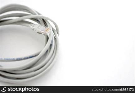 ethernet cable isolated on white background. Top view, defocused