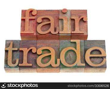 ethical business concept - fair trade words in vintage wood letterpress printing blocks, isolated on white