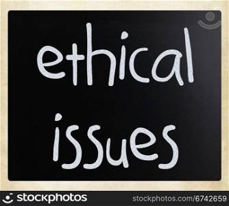 ""Ethical issues" handwritten with white chalk on a blackboard"