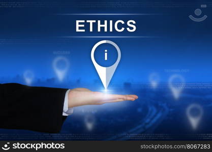 Ethics button with business hand on blurred background