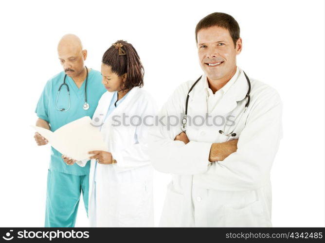 Ethnically diverse medical team. Isolated on white.