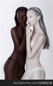 Ethnicity. Fantasy. Futuristic Women Painted White and Black. Art Bodypainting