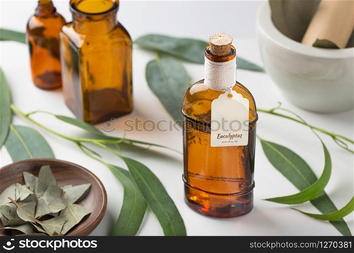 Eucalyptus essential oil with homemade tag. Aromatherapy, spa, herbal remedies