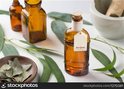 Eucalyptus essential oil with homemade tag. Aromatherapy, spa, herbal remedies