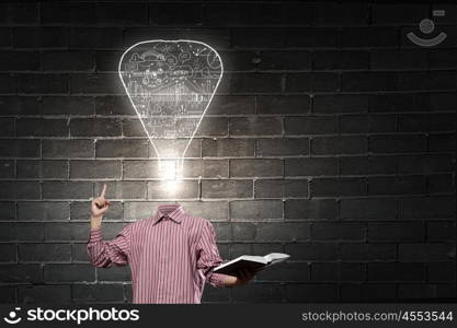 Eureka. Unrecognizable businessman with light bulb instead of head