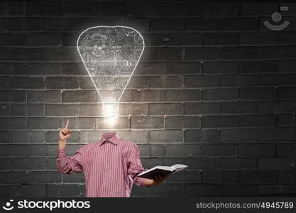 Eureka. Unrecognizable businessman with light bulb instead of head