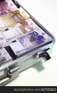 Euro banknotes in a briefcase