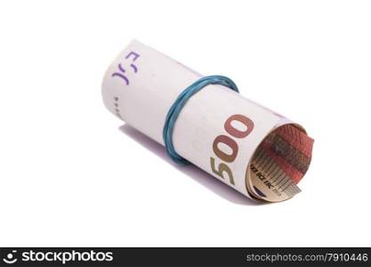 euro banknotes under rubber band isolated