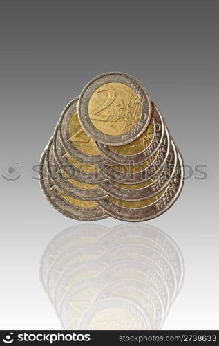 Euro coins and reflection isolated on white background