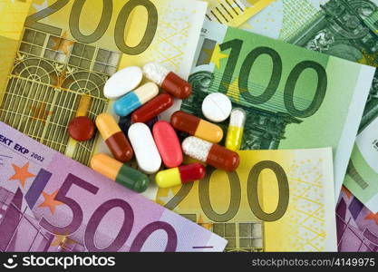 . euro currency notes and tablets. costs of health and medicine
