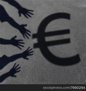 Euro demand as the cast shadow of a group of hands reaching out to grab the European currency symbol as a financial and business concept or money financing issues and economic symbol.