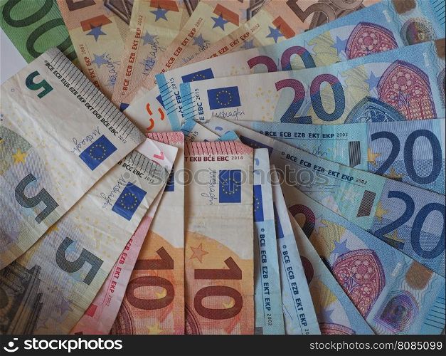 Euro (EUR) notes and coins, European Union (EU). Euro (EUR) banknotes and coins, currency of European Union (EU) useful as a background