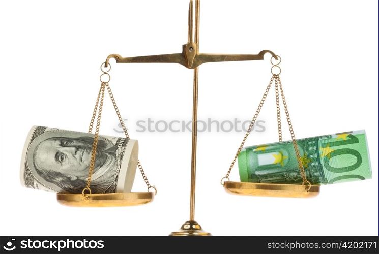euro money and dollar banknotes on a scale. exchange rate
