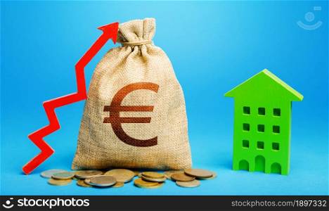 Euro money bag with red up arrow and residential building. Return on investment. Increase in prices for apartments and housing. Municipal budget. Recovery and growth in property cost.