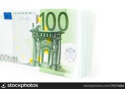 Euro money, Euro cash background. Banknotes of the european union on a white background. Close up. Shallow depth of field.. Euro money, Euro cash background. Banknotes of the european union on a white background. Shallow depth of field.