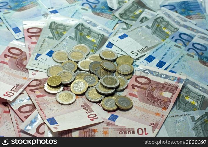 euro money paper and coins on ioalted white