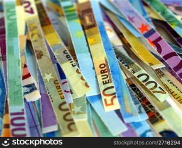 Euro note. Money to burn - banknotes cut with a paper shredder