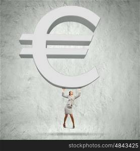 Euro raise. Conceptual image of businesswoman lifting huge euro sign above head