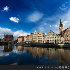 Europe Belgium medieval town travel background - Ghent canal and Graslei street on sunset. Ghent, Belgium