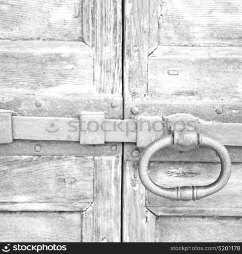 europe old in italy antique close brown door and rusty lock closeup