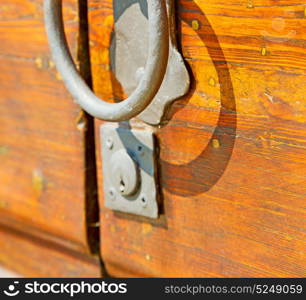 europe old in italy antique close brown door and rusty lock closeup