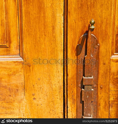 europe old in italy antique close brown door and rusty lock closeup